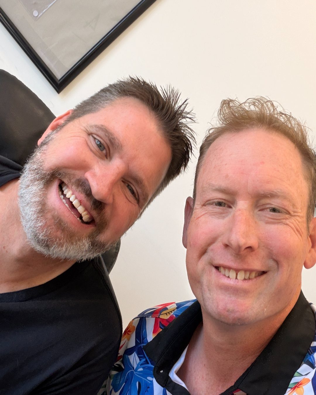 Keith Callister on the left and Franco Preston on the right, in a selfie at the Olympus office