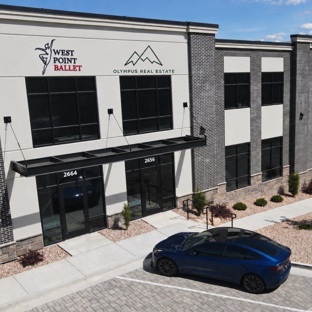 The entrance to the Olympus Real Estate office in Bluffdale, Utah
